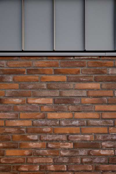 Past and future meet in steel-clad terraced houses with history in the backyard, Jernaldervej 8, 8600 Silkeborg, Denmark